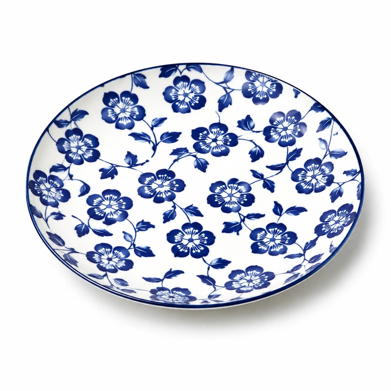Piatto piano rotondo 27 cm in ceramica bianco e blu con motivo floreale